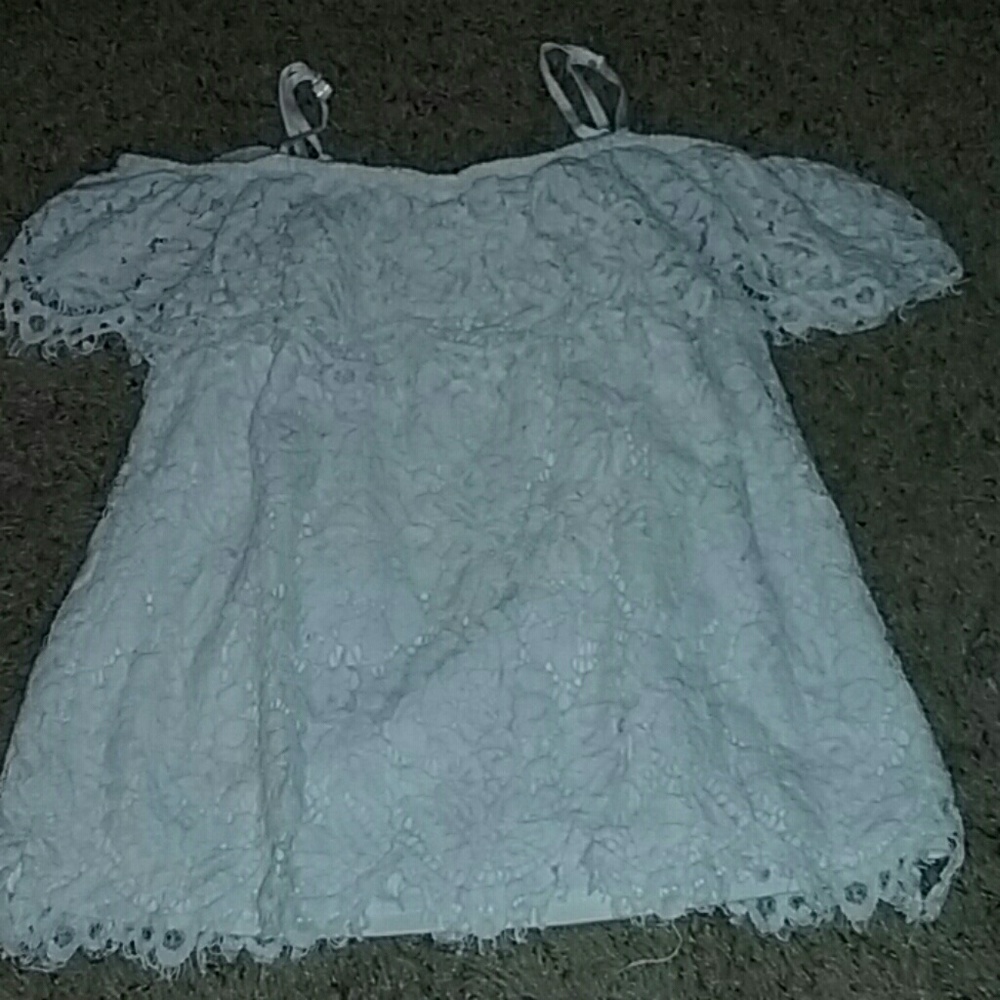 A white cold shoulder shirt